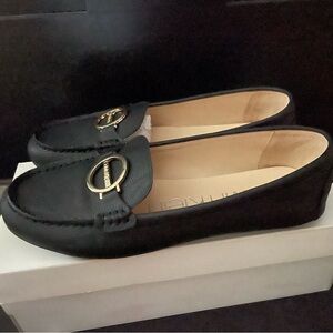 Black and Gold Flats with Elegant Slip-On Design